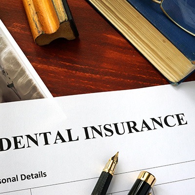 dental insurance form on table