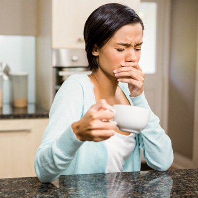 Woman with toothache before root canal treatment Chesapeake
