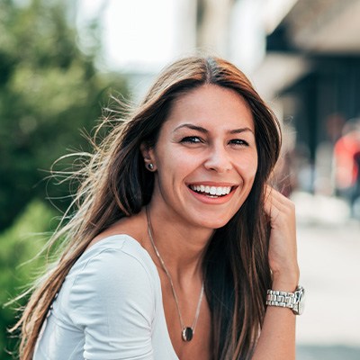 woman smiling after dental crowns in Chesapeake