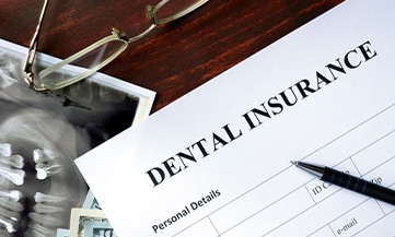 dental insurance form on table