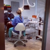 Chesapeake dentist and dental assistant treating a patient