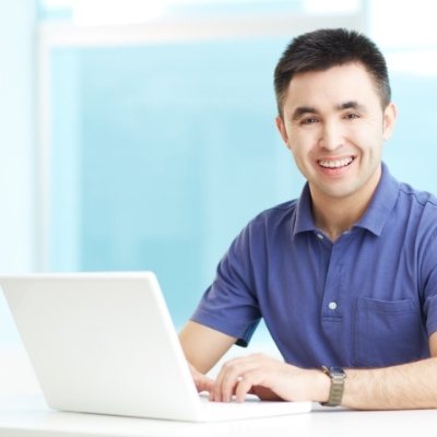 Man enjoying flawless smile after Invisalign treatment