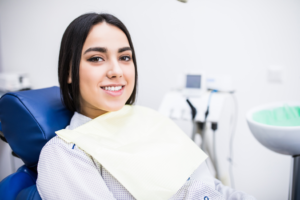 a patient visiting her dentist for root canal therapy