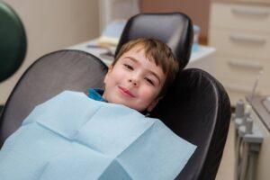 Child in dentist's chair.